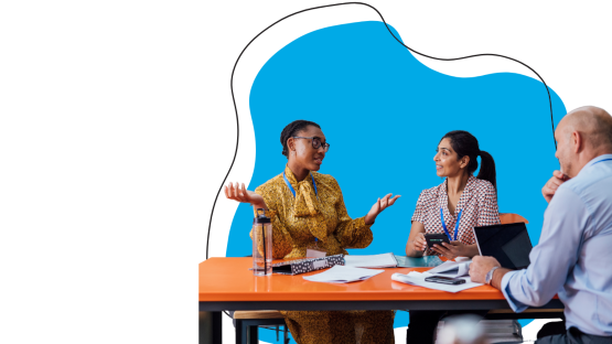 image of educators conversing at a table